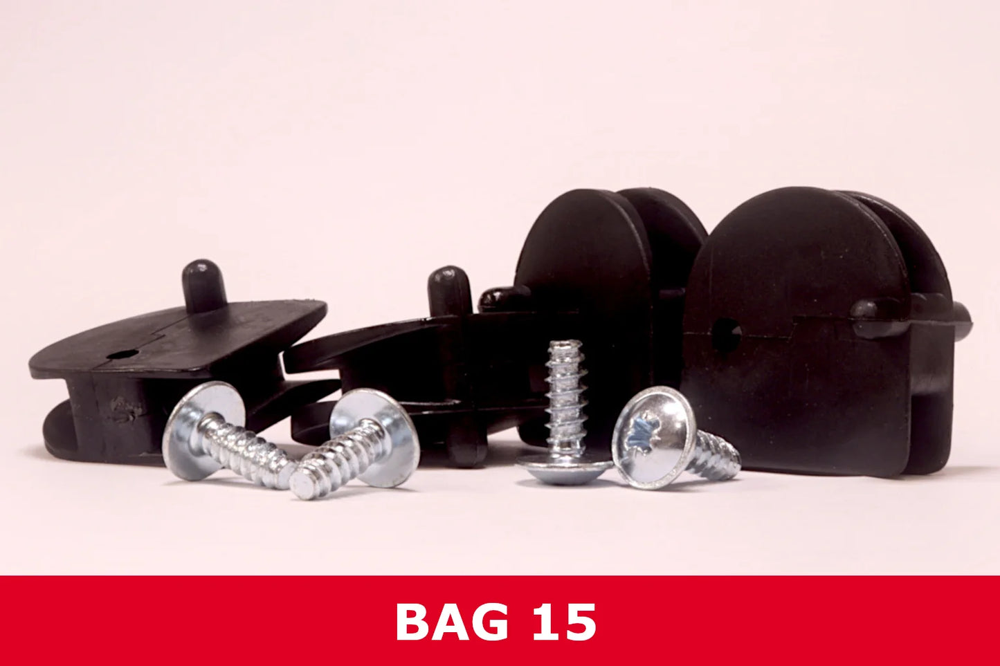Black plastic shed hardware accessories and screws set against a light background, Bag 15.